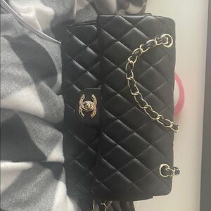 CHANEL Black Quilted Shoulder Bag with Gold Accents